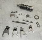 1984 Suzuki Quadrunner Transmission Shift Drum And Forks 25310-2420 Used. Price: $30.00.